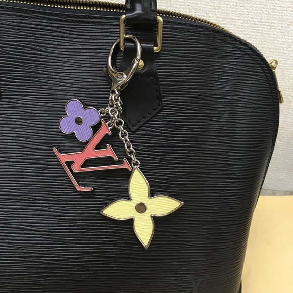 Authentic Louis Vuitton FLEUR D'EPI BAG
CHARM. - Picture 8 of 10
